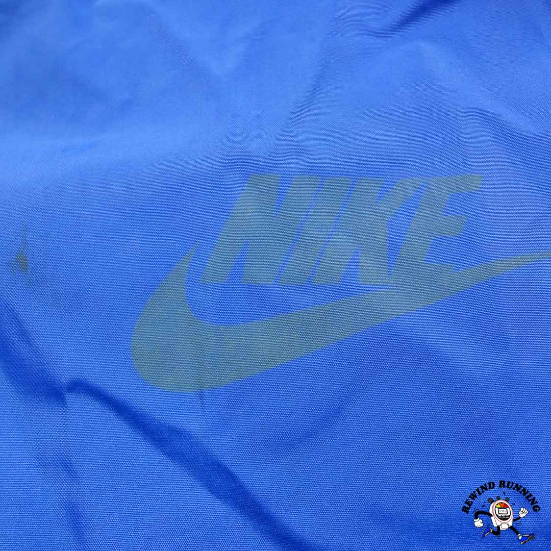 Nike Vintage 70s 80s UCLA Blue & Yellow 1/4 Zip Pullover Windbreaker Anorak L Track Jacket Made in USA Front Swoosh Logo